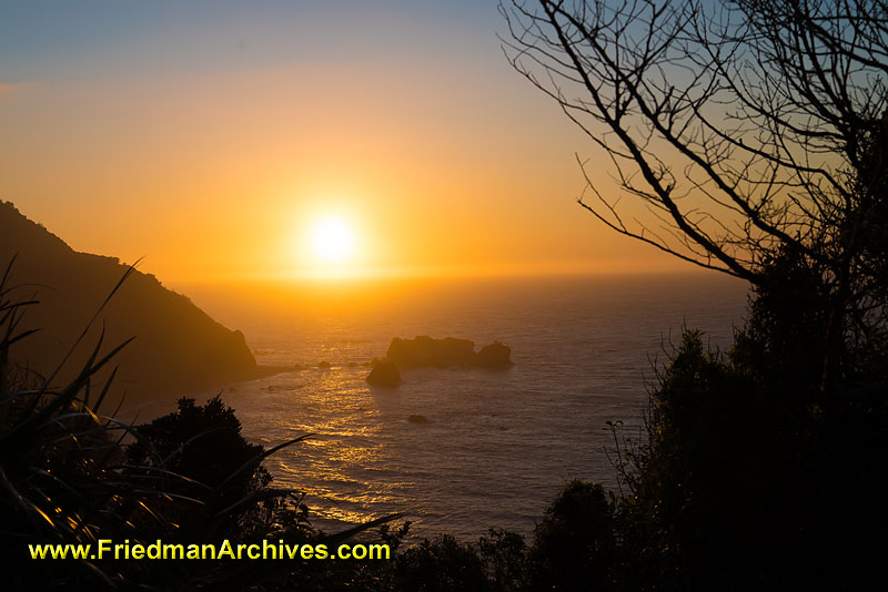 sunset,landscape,road trip,rocks,ocean,cliffs,beach,orange,